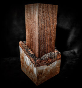 "Handmade rustic urn crafted from Karelian Birch Burl Wood, a unique and timeless choice for preserving the ashes of your loved ones with care and craftsmanship.