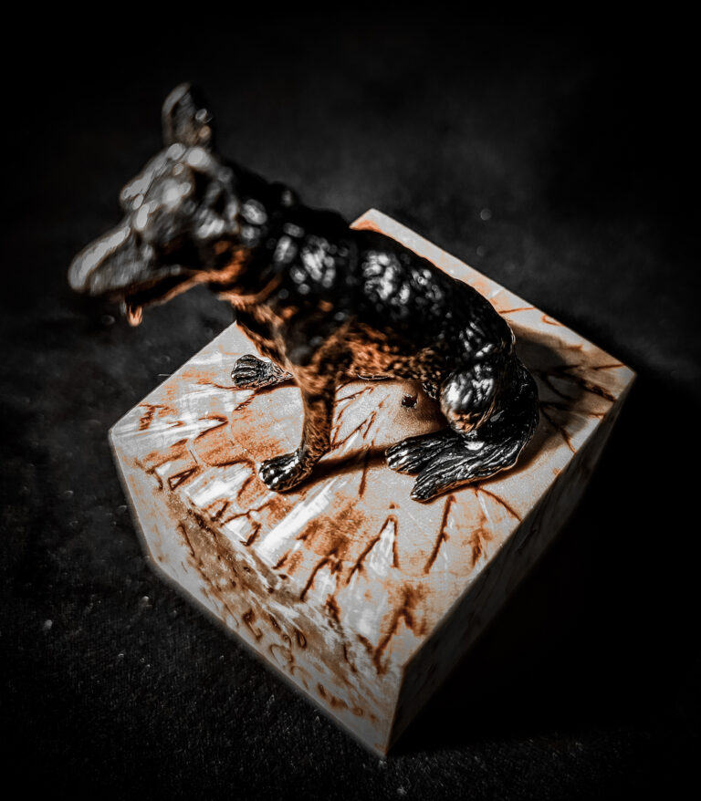 Small urn for dog ashes made of premium Karelian Birch burl wood, a symbol of strength and remembrance.
