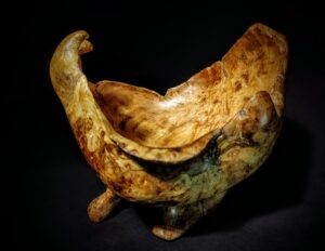 Handcrafted Burl Wood Bowl showcasing nature's intricate patterns – a rustic masterpiece for your home decor