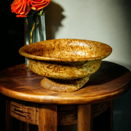Burl wood serving bowl - a blend of style and practicality.