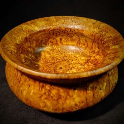 A one-of-a-kind rustic salad bowl made from unique burl wood, blending craftsmanship and nature-inspired design.